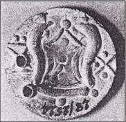 A coin featuring Srivatsa, Thunderbolt Swastika and Elephant goad symbol